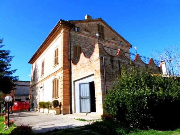 Brick built house with exclusive garden and olive grove for sale in the countryside of Falerone, Fermo province, Marche