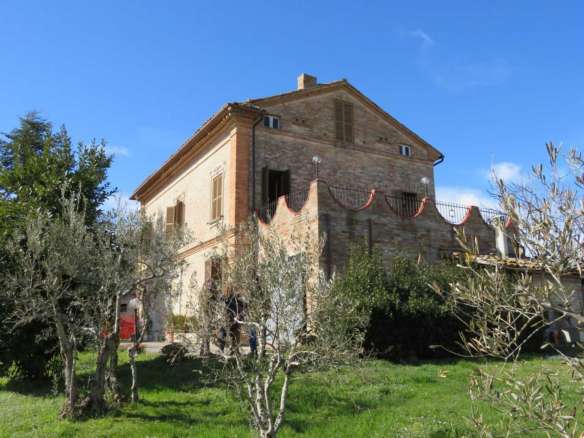 Brick built house with exclusive garden and olive grove for sale in the countryside of Falerone, Fermo province, Marche