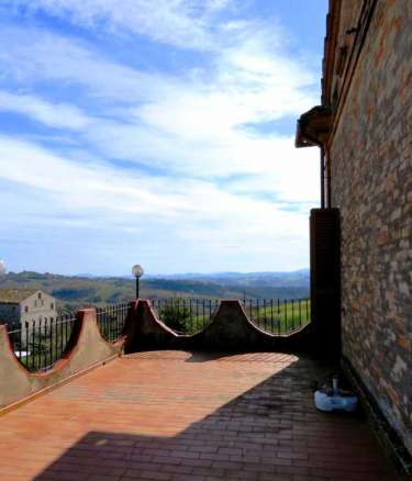 Brick built house with exclusive garden and olive grove for sale in the countryside of Falerone, Fermo province, Marche