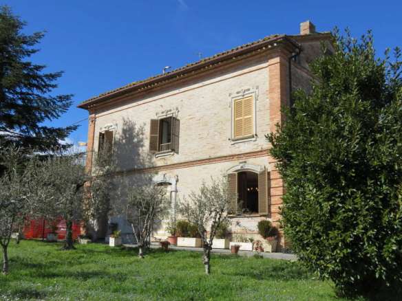 Brick built house with exclusive garden and olive grove for sale in the countryside of Falerone, Fermo province, Marche