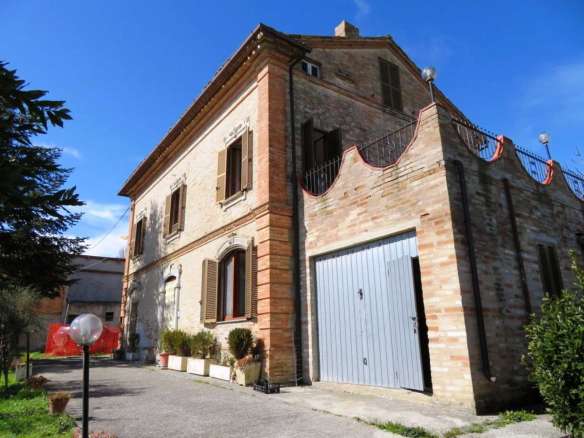 Brick built house with exclusive garden and olive grove for sale in the countryside of Falerone, Fermo province, Marche