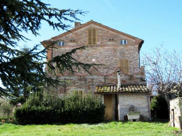 Brick built house with exclusive garden and olive grove for sale in the countryside of Falerone, Fermo province, Marche