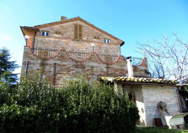 Brick built house with exclusive garden and olive grove for sale in the countryside of Falerone, Fermo province, Marche