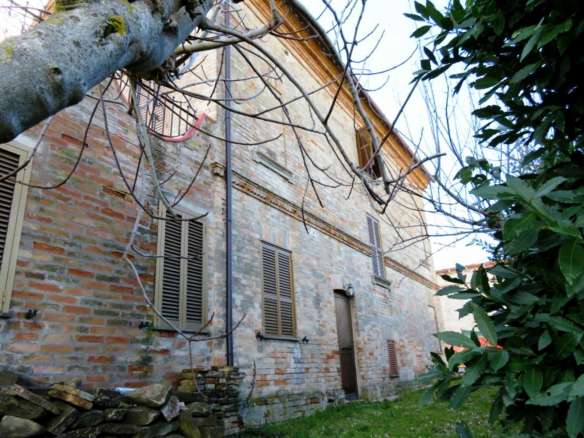 Brick built house with exclusive garden and olive grove for sale in the countryside of Falerone, Fermo province, Marche