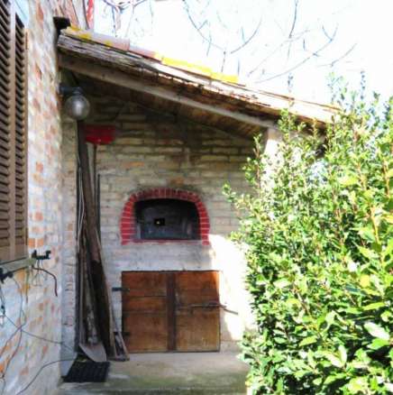 Brick built house with exclusive garden and olive grove for sale in the countryside of Falerone, Fermo province, Marche