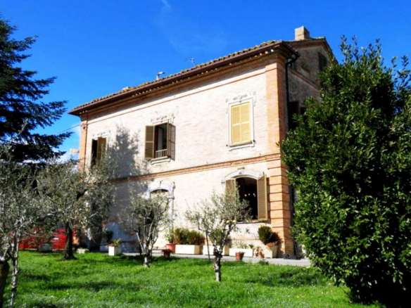 Brick built house with exclusive garden and olive grove for sale in the countryside of Falerone, Fermo province, Marche