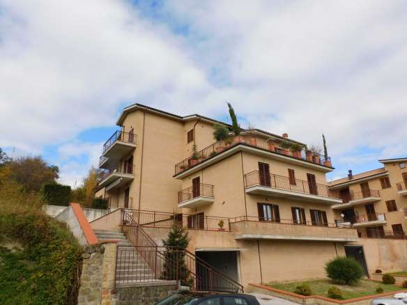 Apartment in Sarnano with views towards the center of the village, the hills and mountains