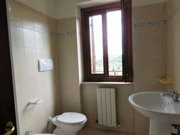 Apartment in Sarnano with views towards the center of the village, the hills and mountains