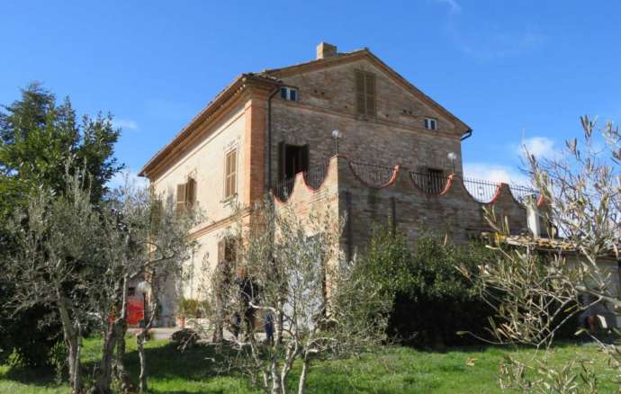 Brick built house with exclusive garden and olive grove for sale in the countryside of Falerone, Fermo province, Marche