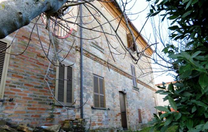 Brick built house with exclusive garden and olive grove for sale in the countryside of Falerone, Fermo province, Marche